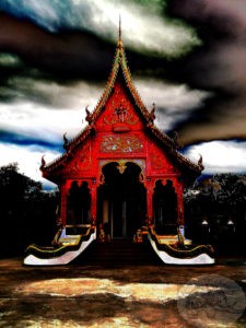 storm clouds over a thai temple