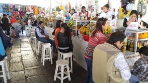 customers at a fruit juice bar