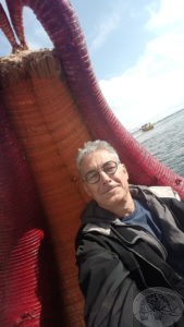 ken on reed boat in lake titicaca peru