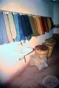 wool hanging to dry before being used to create a carpet