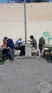 quiet chess game in the market